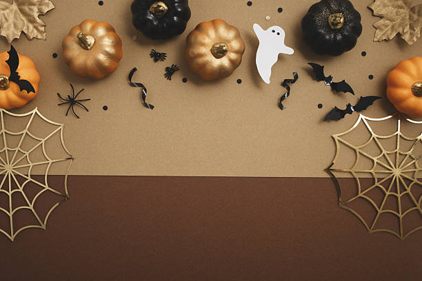 istock Happy halloween background with party decorations from pumpkins, bats, spiderweb, ghosts top view. Mystic autumn greeting card. 2228434785