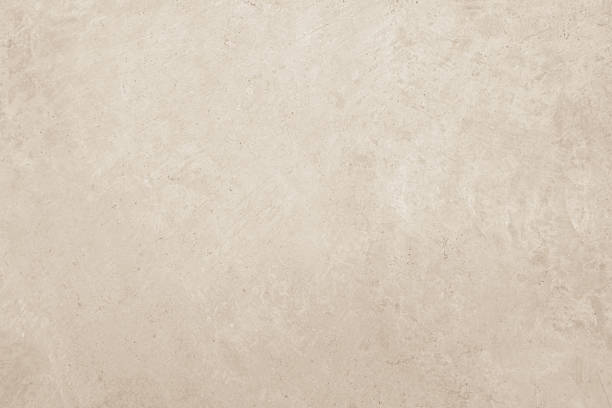 istock Concrete wall texture background. Close up retro plain cream color cement wall background texture. 2228435055