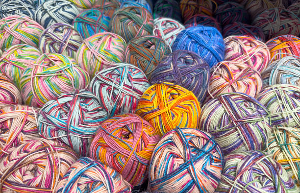 istock Colorful multicolored yarn balls for knitting and crochet projects 2228436942
