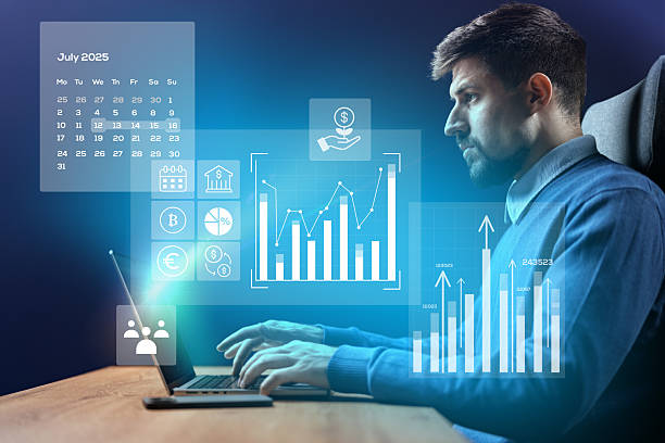 istock Professional working on financial data analysis with digital graphs and charts in a modern workspace in July 2025 2228438863