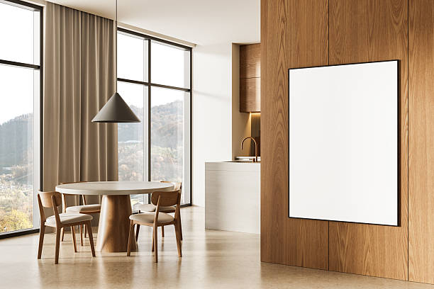 istock Framed blank poster mockup on wooden wall in modern dining room interior with natural light and clean design concept. 3D Rendering 2228442931