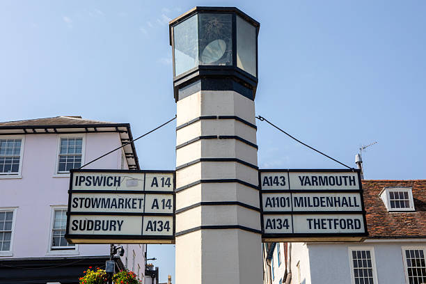 Signposts in the town of Bury St. Edmunds, Suffolk, showing the direction to other local towns and areas - Stowmarket, Sudbury, Ipswich, Yarmouth, Mildenhall and Thetford.