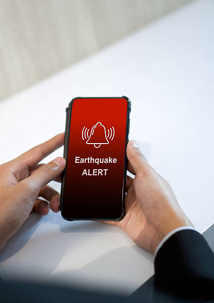 istock Earthquake alert warning displayed on smartphone screen as symbol, telling people to be careful. Technology concept 2228446851