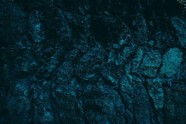 istock Dark turquoise old stone fence 2228447401