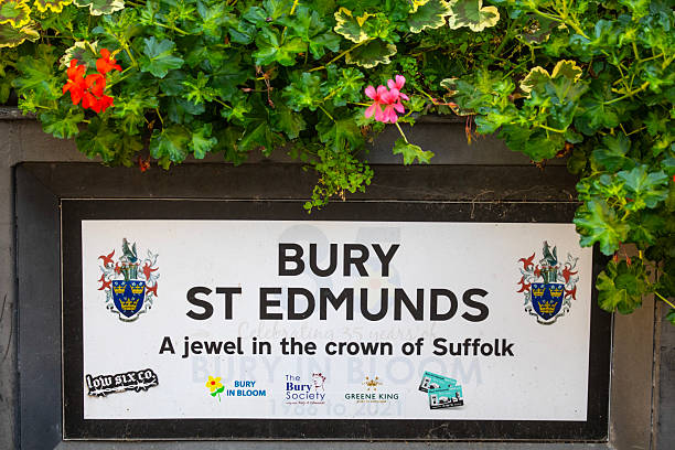 Suffolk, UK - September 6th 2024: Close-up of the Bury St. Edmunds coat of arms and motto pictured on a planter in the town centre.
