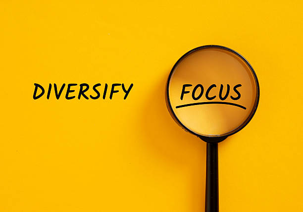 istock Magnifying glass focusing on the word focus and diversifying concept 2228450216