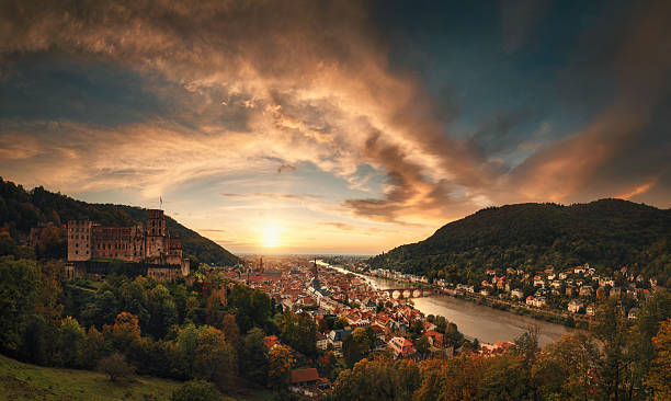 View of Heidelberg, Germany, with dramatic sunset sky stock photo