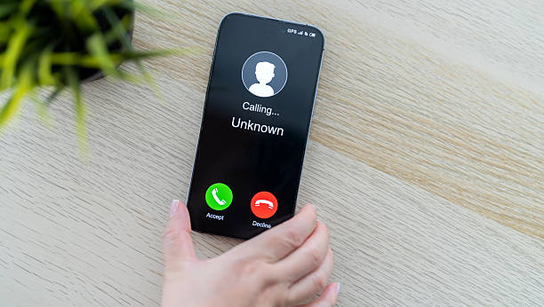 istock Phone scam alert with hacker and scammer calling unknown number, cybercrime, data theft, phishing attempt, fraud alert, digital security threat, cyber attack warning technology and crime concept 2228455649