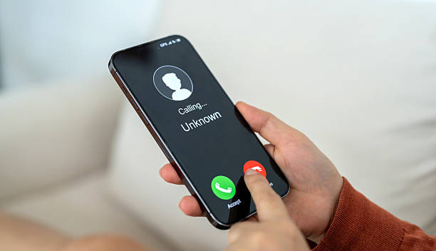 istock Phone scam alert with hacker and scammer calling unknown number, cybercrime, data theft, phishing attempt, fraud alert, digital security threat, cyber attack warning technology and crime concept 2228455659
