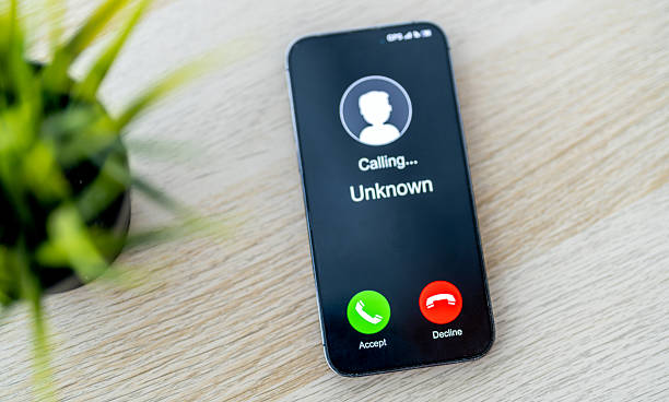 istock Phone scam alert with hacker and scammer calling unknown number, cybercrime, data theft, phishing attempt, fraud alert, digital security threat, cyber attack warning technology and crime concept 2228455661