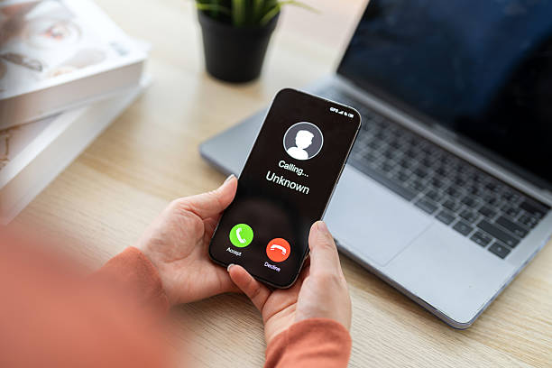 istock Phone scam alert with hacker and scammer calling unknown number, cybercrime, data theft, phishing attempt, fraud alert, digital security threat, cyber attack warning technology and crime concept 2228455666