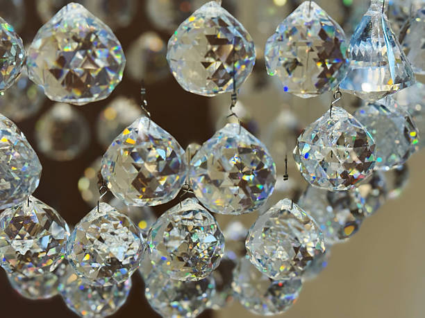 istock luxury crystal chandelier close-up, luxury background. 2228460676