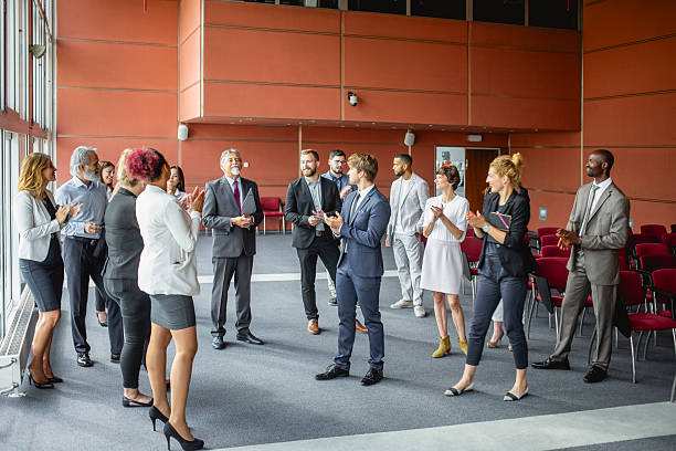 istock Diverse Business Executives Engaging in Applause at a Conference 2228461951