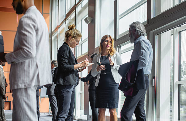 istock Diverse Business Executives Networking at a Conference Event 2228461999