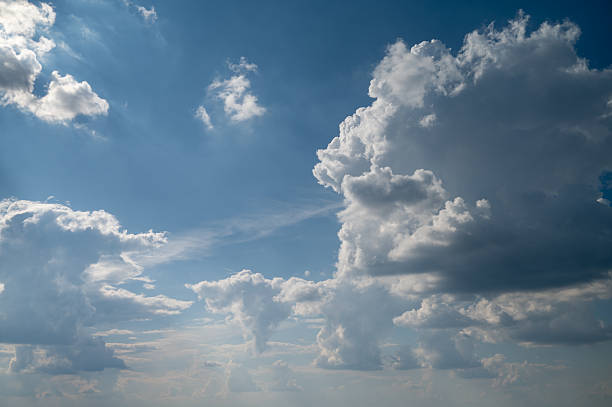 istock Blue sky with white clouds on a sunny day 2228466816