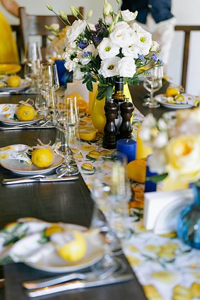istock Elegant Summer Table Setting with Lemons and Fresh Flowers. 2228467747
