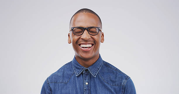 istock Laughing, glasses and business black man in studio for it support, entrepreneur or pride. Startup, happiness and professional with person on white background space for technician and confidence 2228470521