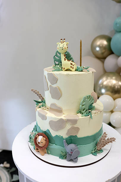 istock A children's birthday cake decorated with animal figures. 2228474599