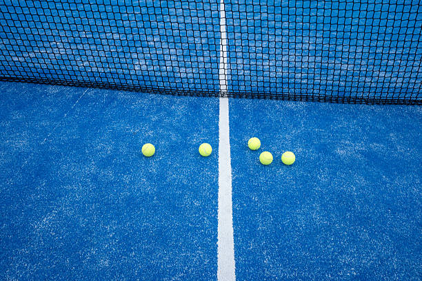 istock Padel sport concept with yellow balls ready for a match. 2228475411