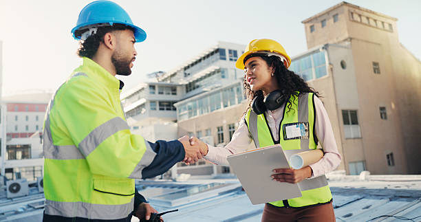 istock Outdoor, engineer and team with blueprint, handshake and agreement for property development or city. Architecture, man and shaking hands with woman for construction, thank you and collaboration 2228476370