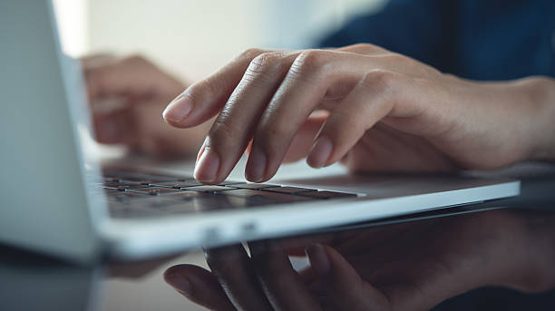 istock Closeup, business woman's hands working and typing on laptop computer keyboard on office table. Woman or student using laptop for online studying, internet marketing,  work from home 2228476822