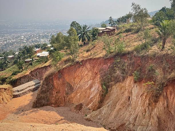 istock We are implementing ecological restoration through resilient infrastructure to address the issue of weak drainage. July 20, 2024. The region around Nyamutenderi, Burundi. 2228478091