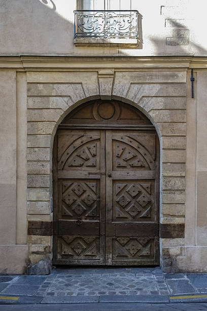 istock Paris, an ancient wooden door 2228478446