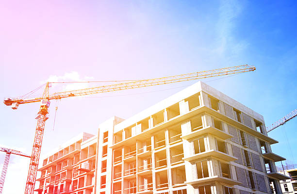 istock Tower crane on apartment Construction. Block House building construction. 2228481605