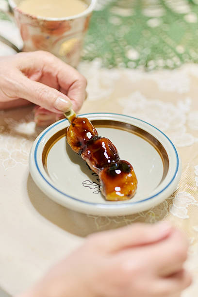 Senior women eating Japanese sweets