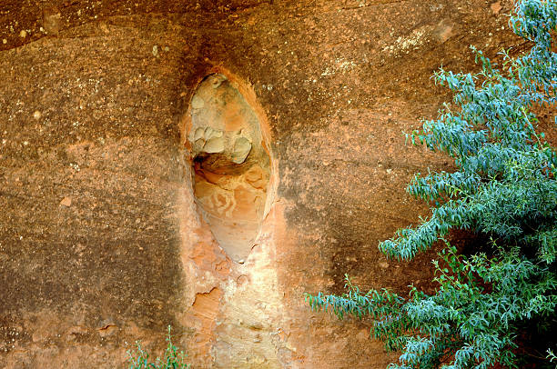 Petroglyphs Native American Rock Art on walls of Colorado River in Northern Arizona