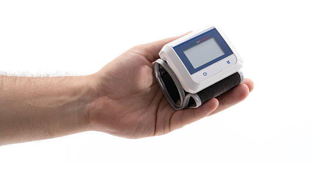 istock Hand with digital blood pressure monitor 2228487708