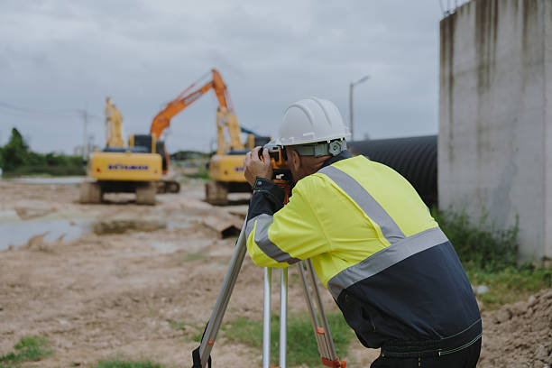 istock Construction engineers are discussing and using machinery and macros for large-scale construction projects. 2228492711