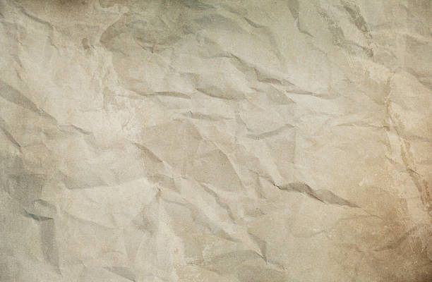 istock Crumpled old paper texture for design. 2228495405
