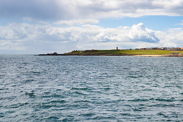 View from  Anstruther harbour to the beach and the golf course