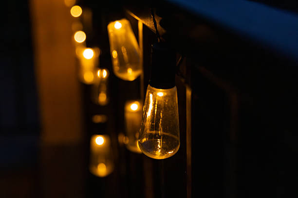istock Warm string lights illuminating the night on a balcony 2228511937