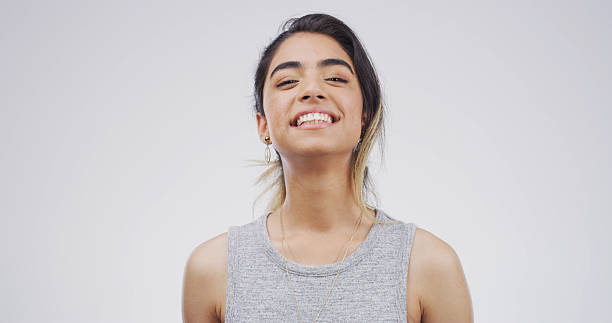 istock Comedy, funny and portrait with student woman on studio space for education, humor or satisfaction. Comic, joke and laughing with happy person isolated on white background for college scholarship 2228512366