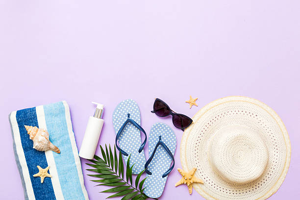 istock Top view travel or vacation concept. Composition with stylish beach accessories on colored background, top view. Beach fashion flat lay, summer concept. Trendy colors 2228513118