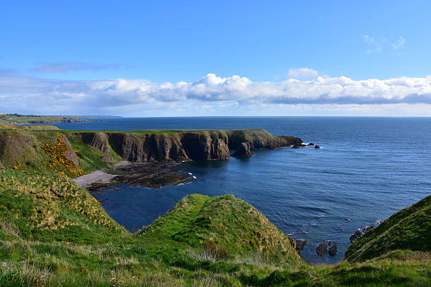 istock Sea Cliffs Jutting Into the Ocean Around a Bay 2228515902