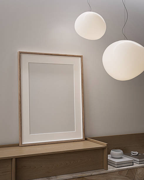 istock Modern Living Room Poster Frame Mockup with Natural Light and Minimalist Decoration. 3D render. 2228518991