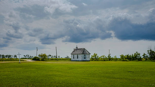 St. Norberts Roman Catholic Church in a rural winter landscape