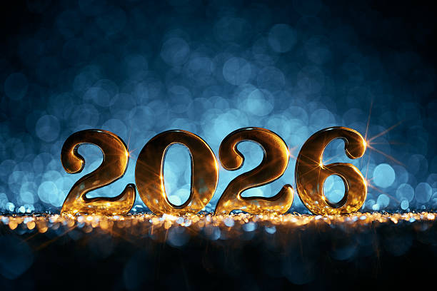 istock Golden 2026 Numbers on Glittering Surface with Blue Bokeh Light Background 2228519708