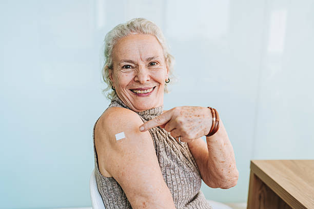 istock Woman showing vaccinated arm 2228523844