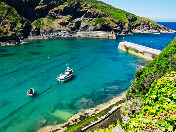 Port Isaac. A tranquil cove with turquoise water, boats, Doc Martin country