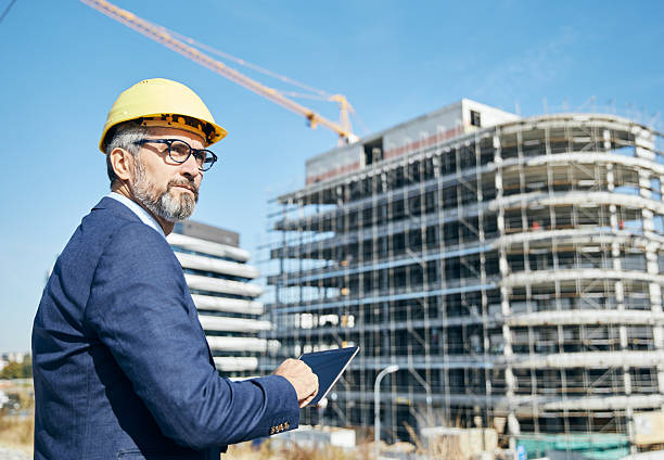 istock businessman construction site business architect building engineer builder tablet helmet architecture blueprint worker man contractor adult engineering industry 2228530857