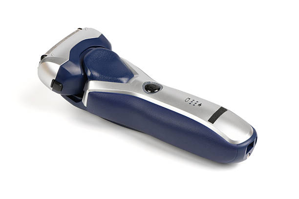 Electric razor. A battery-powered razor on a white background. High resolution photo. Full depth of field.