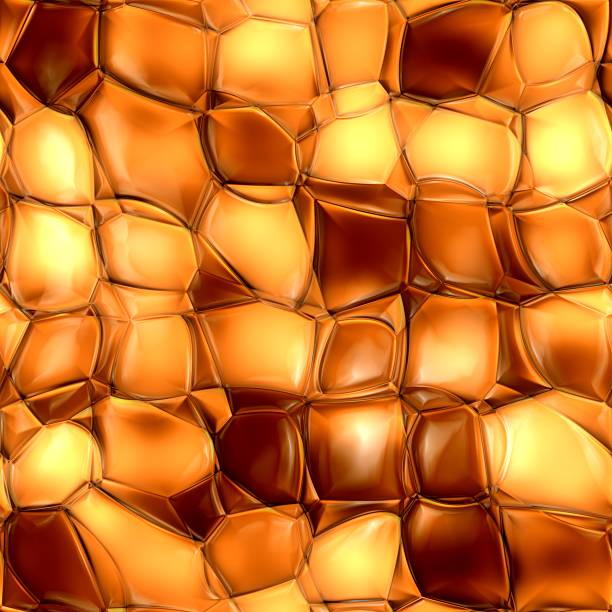 Wall made of decorative tiles with internal illumination in yellow and white with dark areas.
