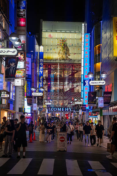 istock Lit-Up Street in Tokyo at Night 2228534222