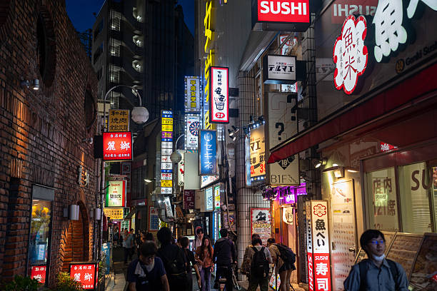 istock Lit-Up Street in Tokyo at Night 2228534225