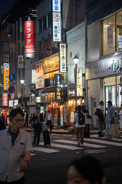 istock Lit-Up Street in Tokyo at Night 2228534234