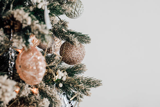 istock Decorative ornaments on a festive Christmas tree with a neutral background 2228540510